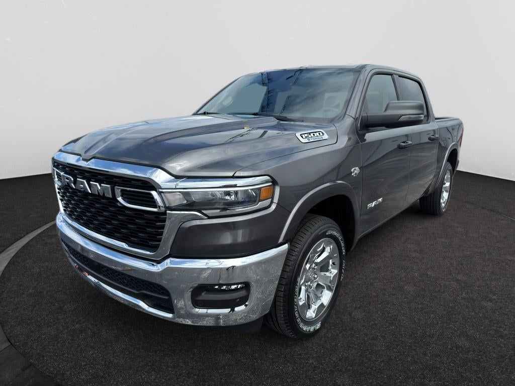 2026 RAM Ram 1500 RAM 1500 BIG HORN CREW CAB 4X4 5'7' BOX in Granite Crystal Metallic Clear-Coat Exterior Paint — front three-quarter view