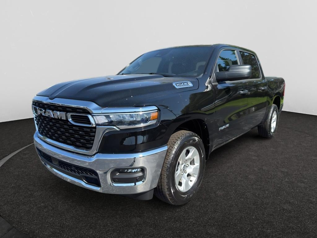 2026 RAM Ram 1500 RAM 1500 BIG HORN CREW CAB 4X4 5'7' BOX in Diamond Black Crystal Pearl-Coat Exterior Paint — front three-quarter view