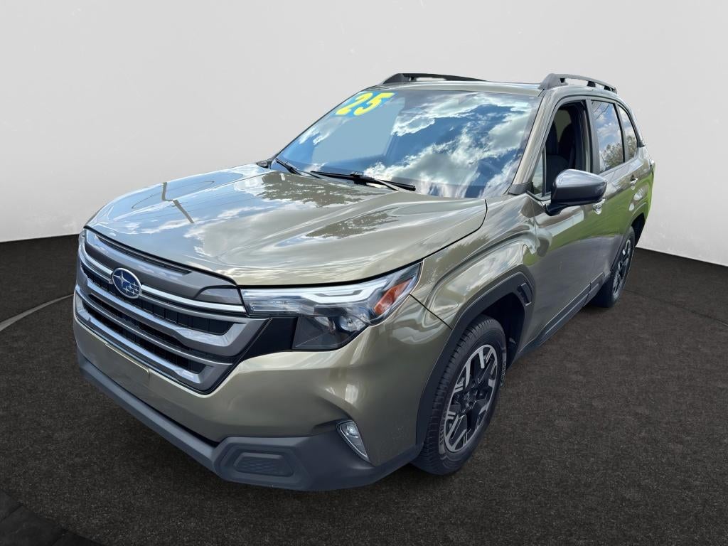 2025 Subaru Forester Premium in Autumn Green Metallic — front three-quarter view
