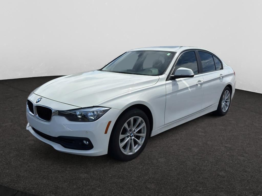 2017 BMW 320i 320i in Alpine White — front three-quarter view