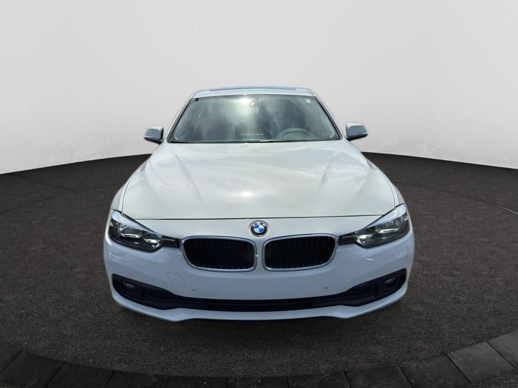 2017 BMW 320i — side profile view